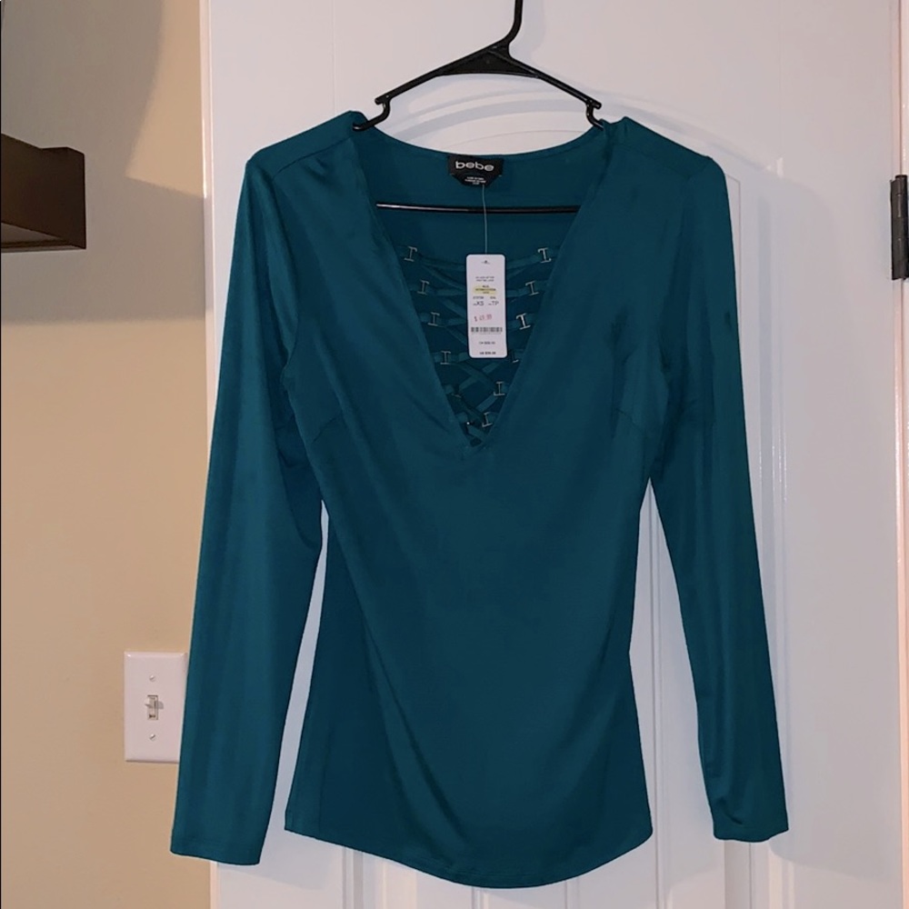 NWT Bebe XS lace up turquoise top